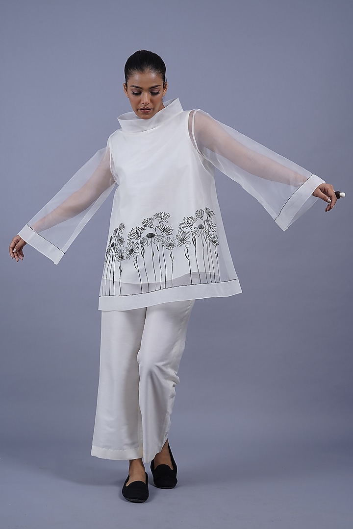 Egg White Organza Machine Embroidered Top by Taika By Poonam Bhagat at Pernia's Pop Up Shop