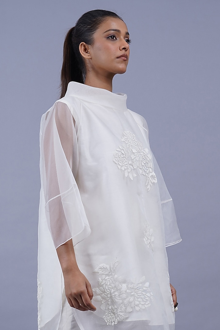 Egg White Organza Machine Embroidered Top by Taika By Poonam Bhagat at Pernia's Pop Up Shop