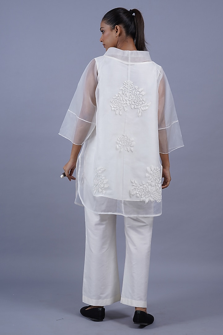 Egg White Organza Machine Embroidered Top by Taika By Poonam Bhagat at Pernia's Pop Up Shop