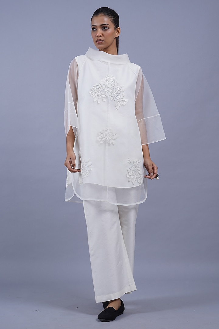 Egg White Organza Machine Embroidered Top by Taika By Poonam Bhagat at Pernia's Pop Up Shop