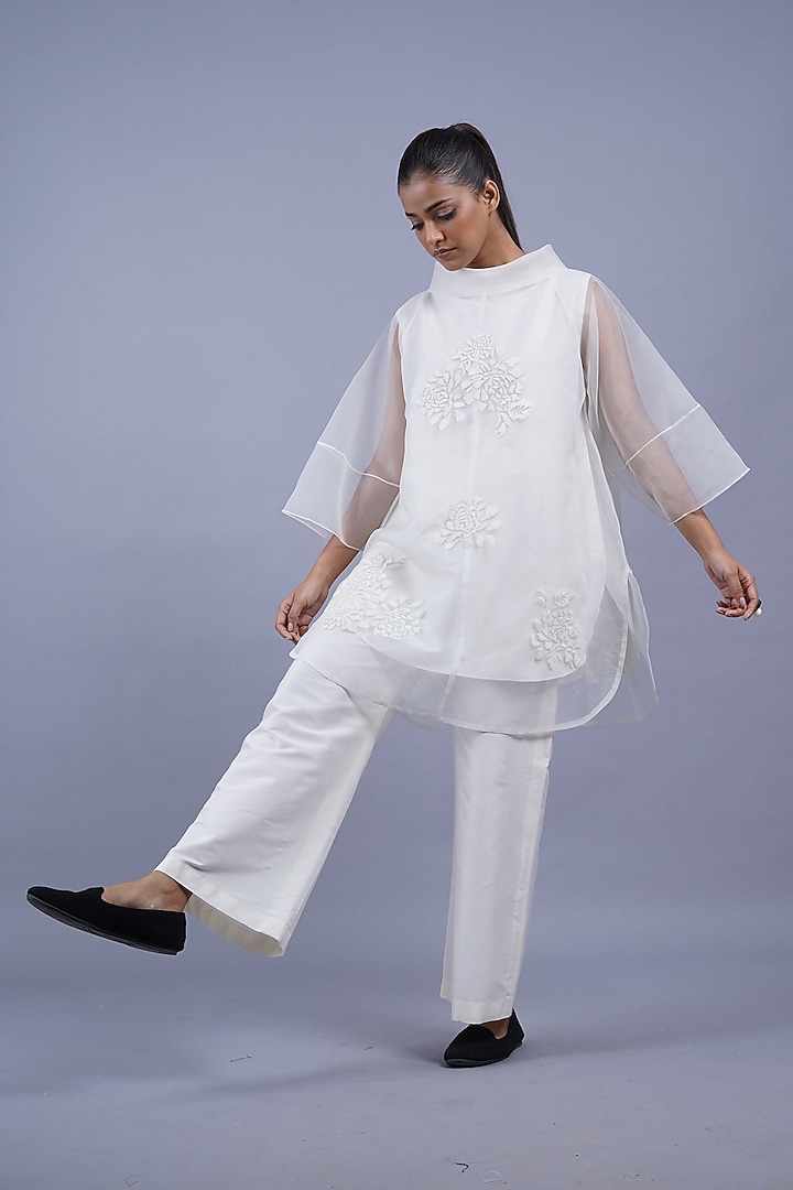 Egg White Organza Machine Embroidered Top by Taika By Poonam Bhagat at Pernia's Pop Up Shop