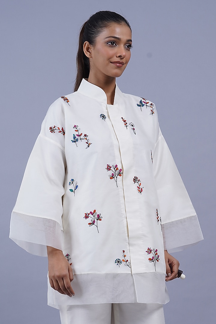 Egg White Organza Machine Embroidered Top by Taika By Poonam Bhagat at Pernia's Pop Up Shop