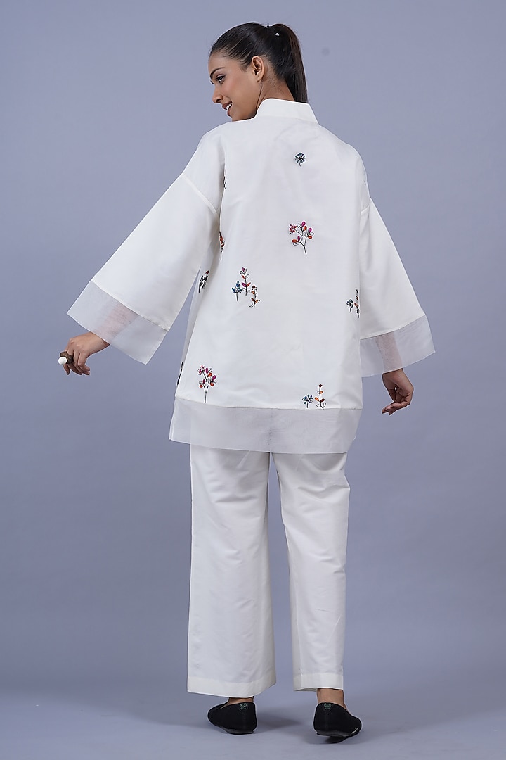 Egg White Organza Machine Embroidered Top by Taika By Poonam Bhagat at Pernia's Pop Up Shop