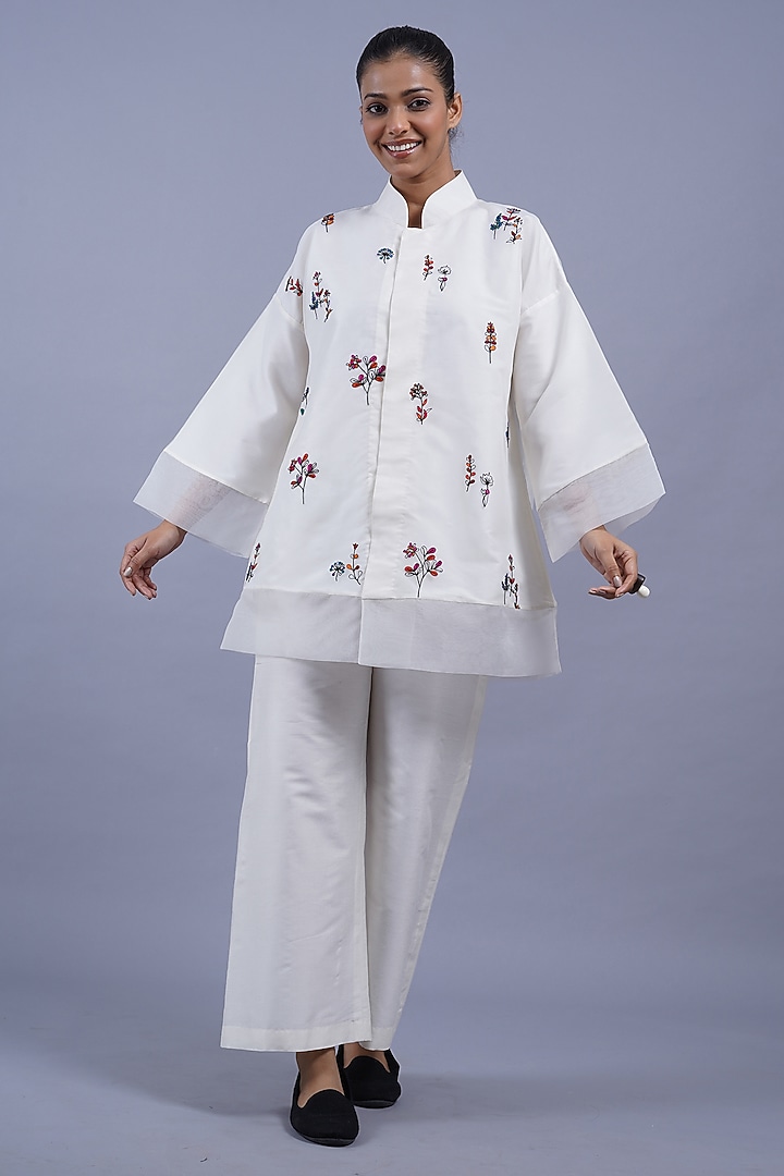 Egg White Organza Machine Embroidered Top by Taika By Poonam Bhagat at Pernia's Pop Up Shop