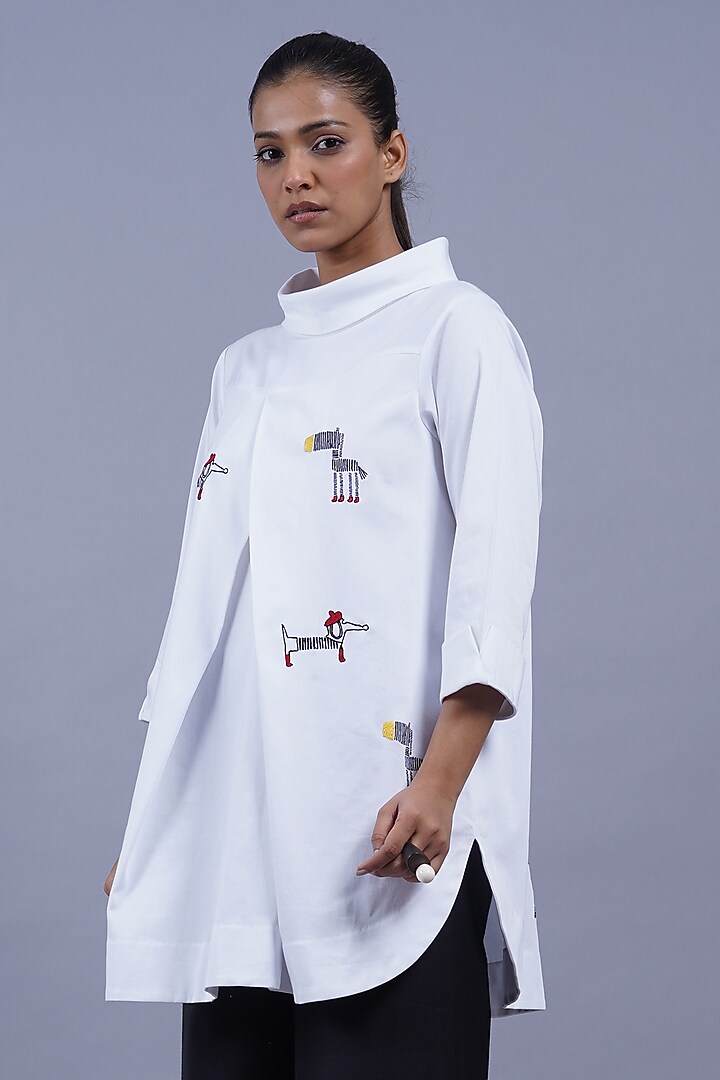 White Cotton Machine Embroidered Top by Taika By Poonam Bhagat at Pernia's Pop Up Shop