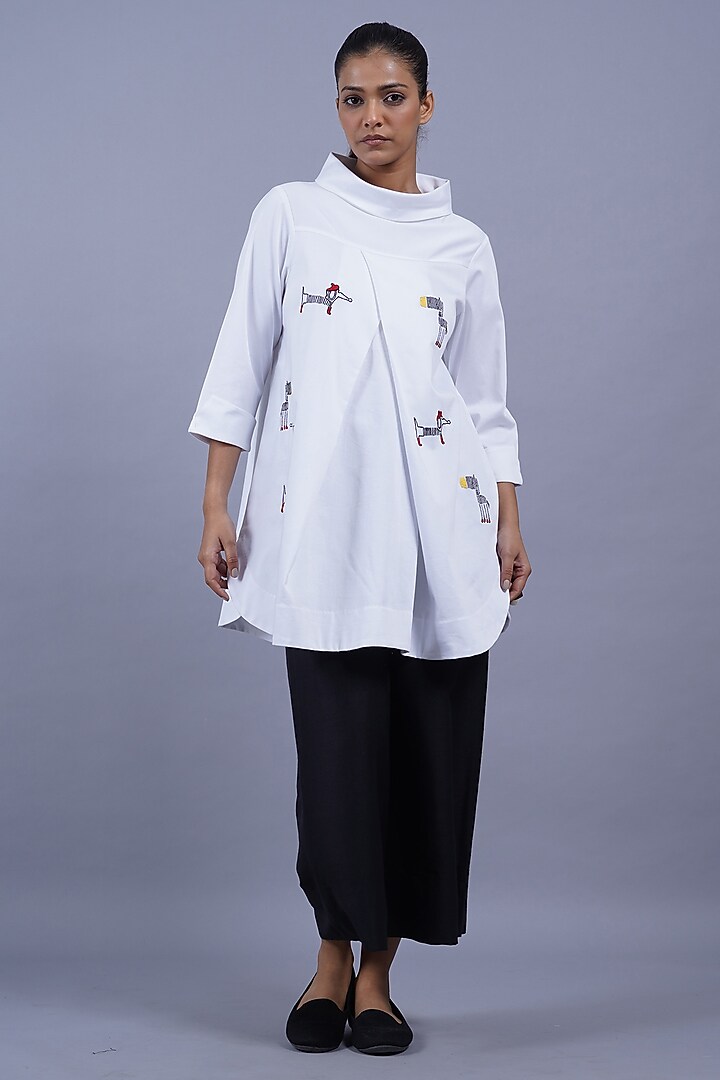 White Cotton Machine Embroidered Top by Taika By Poonam Bhagat at Pernia's Pop Up Shop