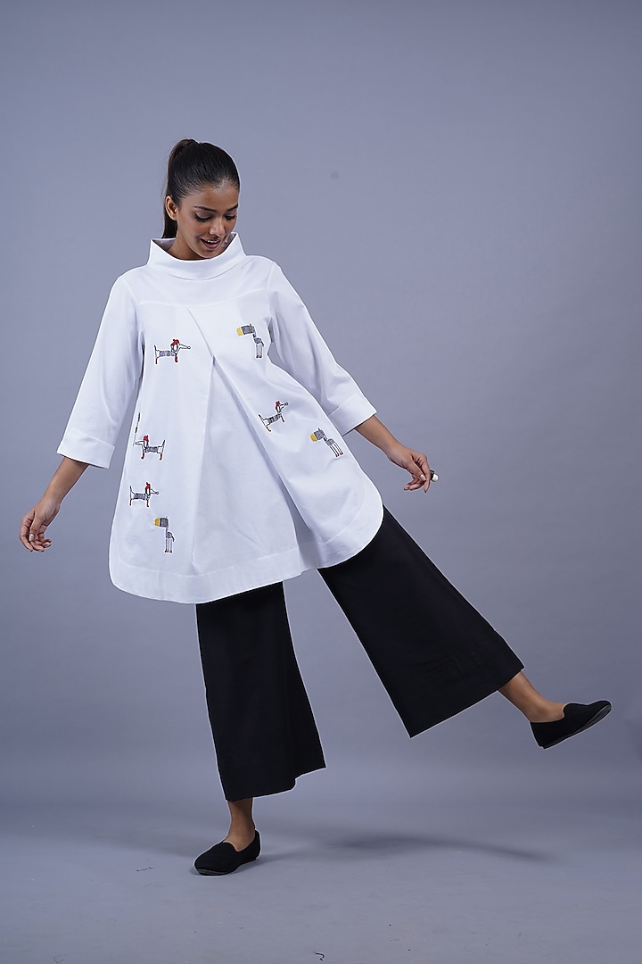 White Cotton Machine Embroidered Top by Taika By Poonam Bhagat at Pernia's Pop Up Shop