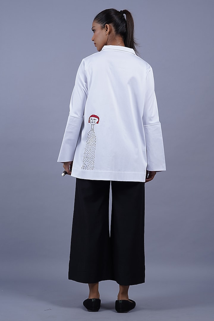 White Cotton Machine Embroidered Top by Taika By Poonam Bhagat at Pernia's Pop Up Shop