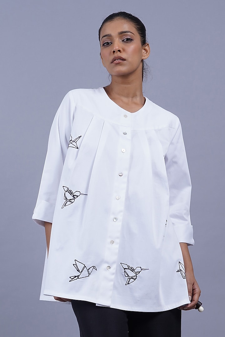 White Cotton Machine Embroidered Top by Taika By Poonam Bhagat at Pernia's Pop Up Shop