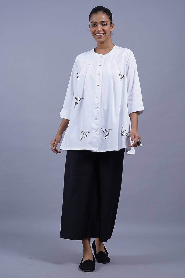 White Cotton Machine Embroidered Top by Taika By Poonam Bhagat at Pernia's Pop Up Shop