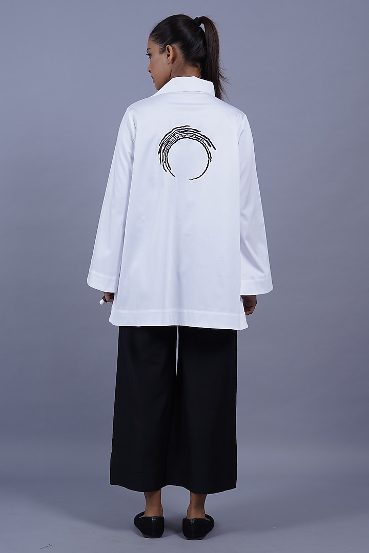 White Cotton Machine Embroidered Top by Taika By Poonam Bhagat at Pernia's Pop Up Shop