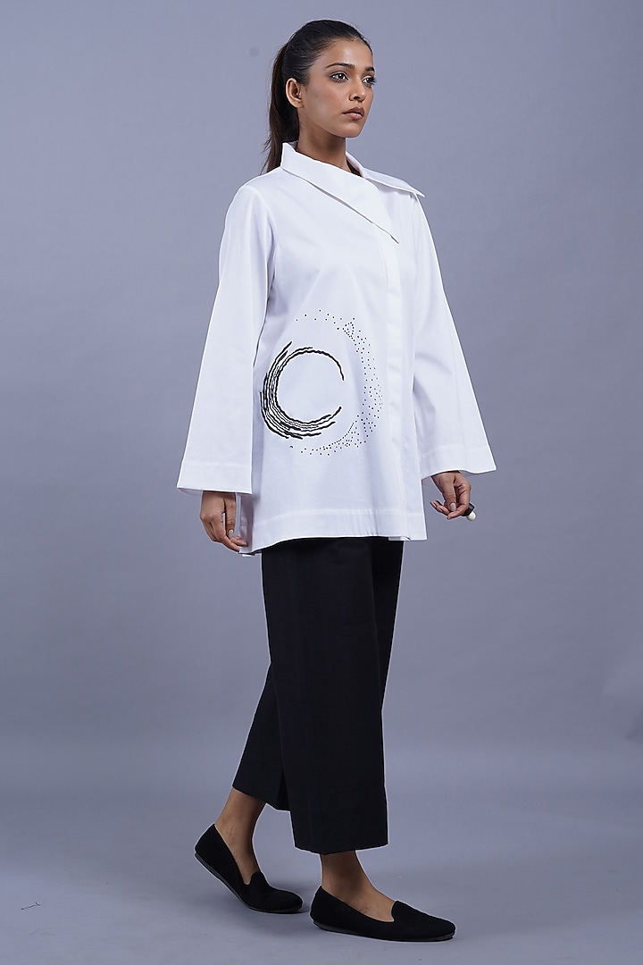White Cotton Machine Embroidered Top by Taika By Poonam Bhagat at Pernia's Pop Up Shop