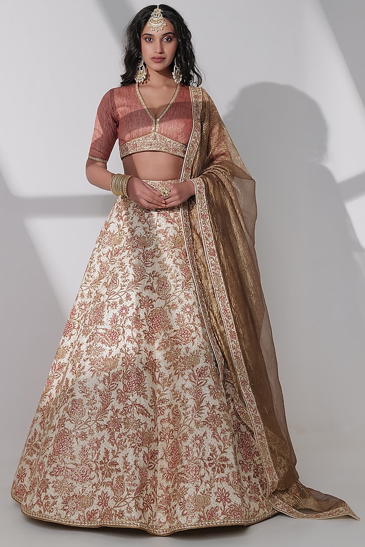 Ivory Pure Tussar Silk Embroidered Bridal Lehenga Set by Taisha at Pernia's Pop Up Shop