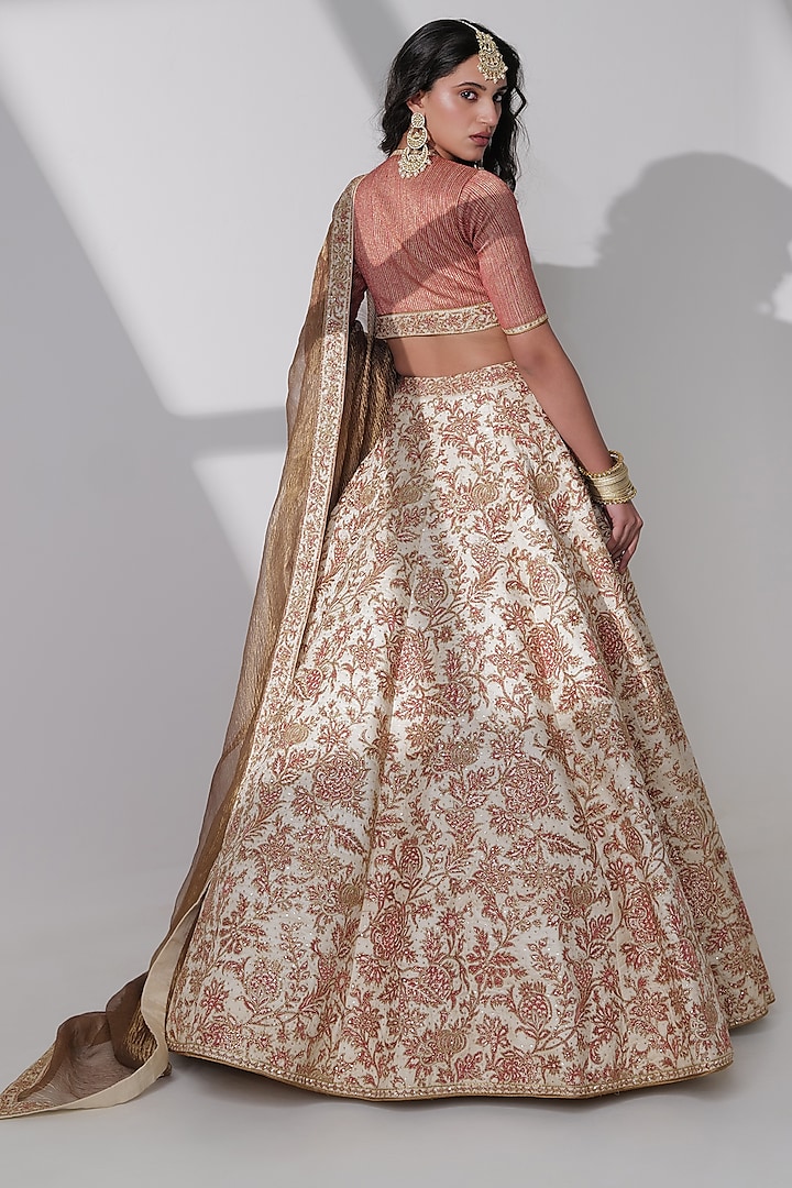 Ivory Pure Tussar Silk Embroidered Bridal Lehenga Set by Taisha at Pernia's Pop Up Shop