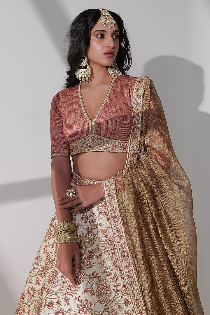 Ivory Pure Tussar Silk Embroidered Bridal Lehenga Set by Taisha at Pernia's Pop Up Shop