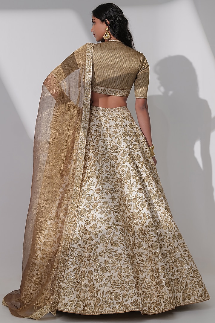 Beige Tussar Silk Embroidered Bridal Lehenga Set by Taisha at Pernia's Pop Up Shop