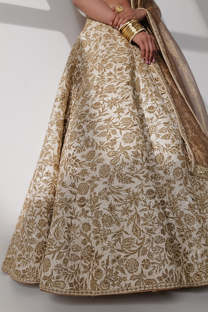 Beige Tussar Silk Embroidered Bridal Lehenga Set by Taisha at Pernia's Pop Up Shop
