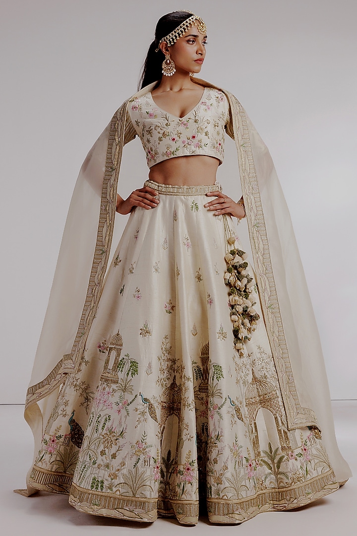 Ivory Pure Raw Silk Hand Embroidered Bridal Lehenga Set by Taisha at Pernia's Pop Up Shop