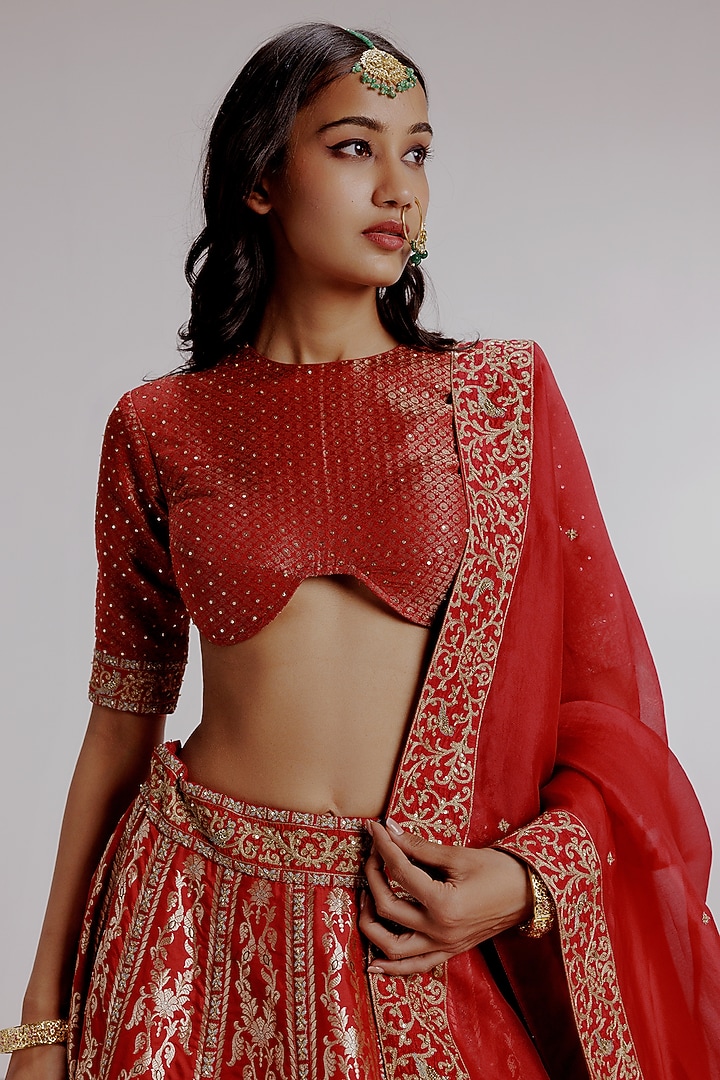 Red Banarasi Katan Silk Hand Embroidered Bridal Lehenga Set by Taisha at Pernia's Pop Up Shop
