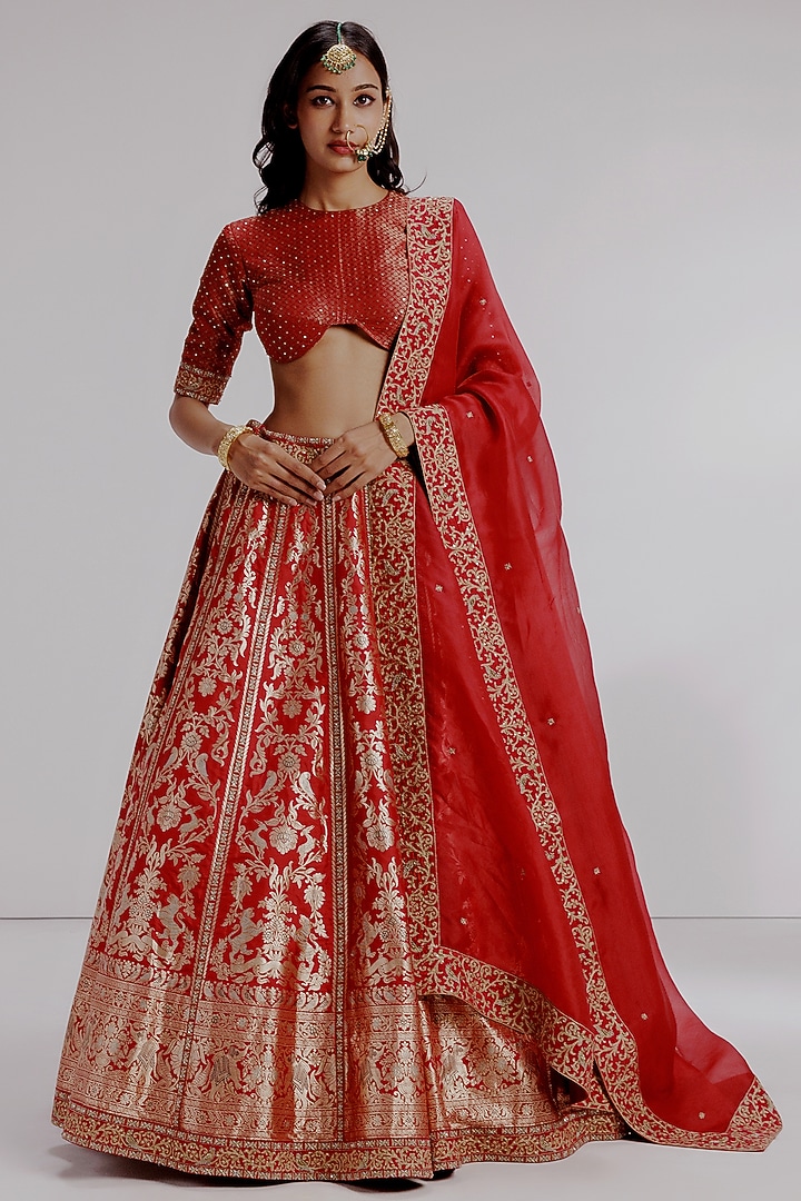 Red Banarasi Katan Silk Hand Embroidered Bridal Lehenga Set by Taisha at Pernia's Pop Up Shop