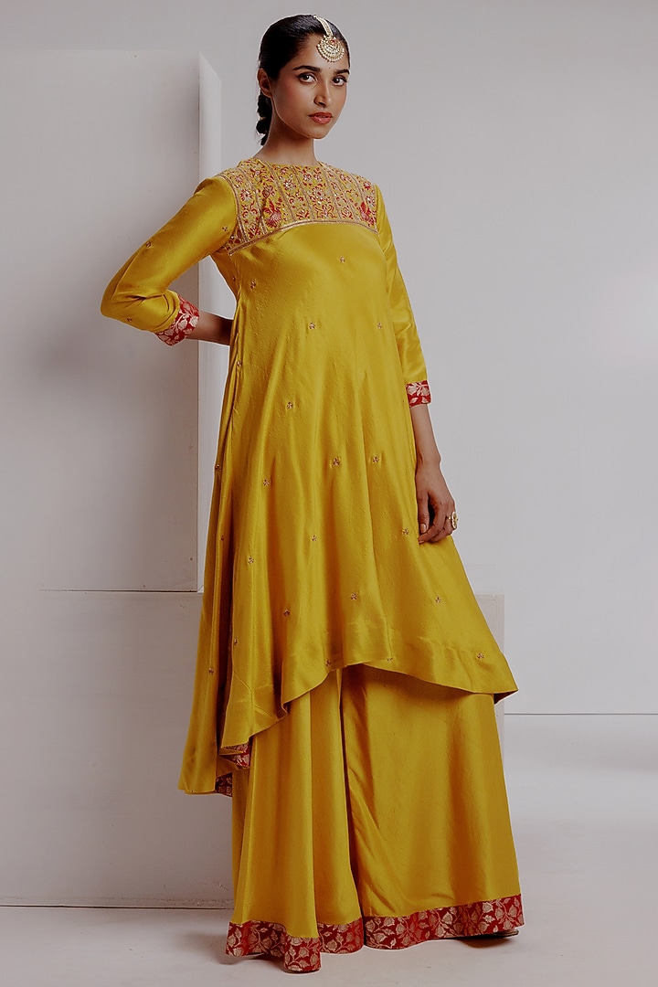 Yellow Pure Knitted Dupion Silk Hand Embroidered Kurta Set by Taisha at Pernia's Pop Up Shop