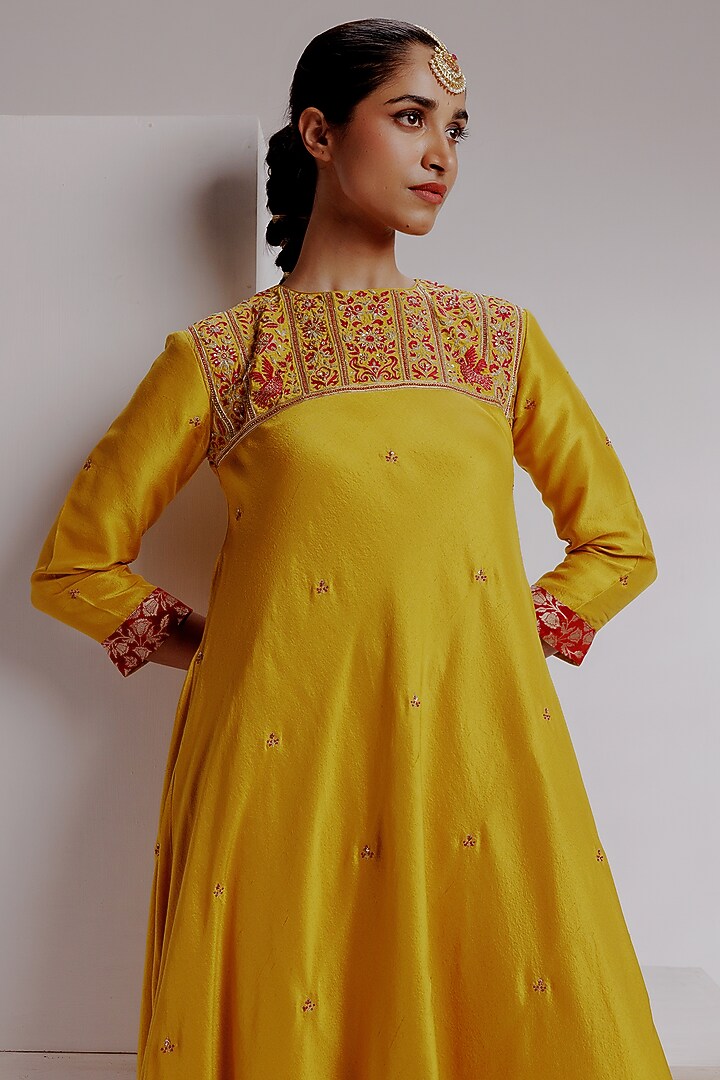 Yellow Pure Knitted Dupion Silk Hand Embroidered Kurta Set by Taisha at Pernia's Pop Up Shop