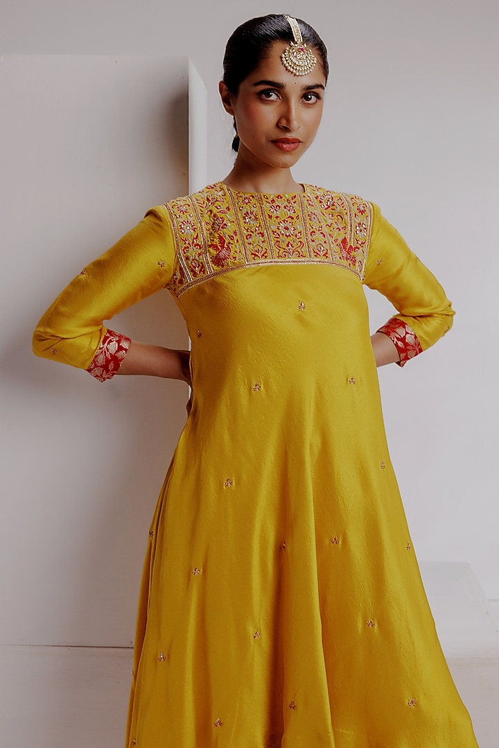 Yellow Pure Knitted Dupion Silk Hand Embroidered Kurta Set by Taisha at Pernia's Pop Up Shop