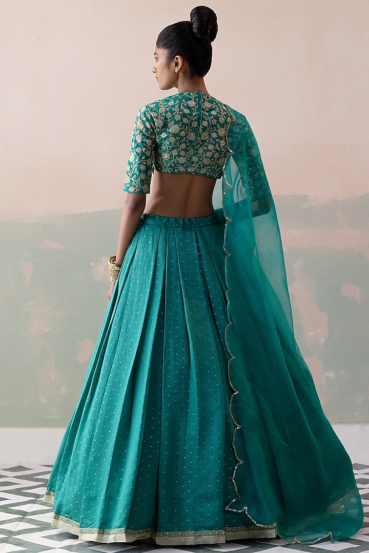 Peacock Green Pure Moonga Silk Embroidered Wedding Lehenga Set by Taisha at Pernia's Pop Up Shop