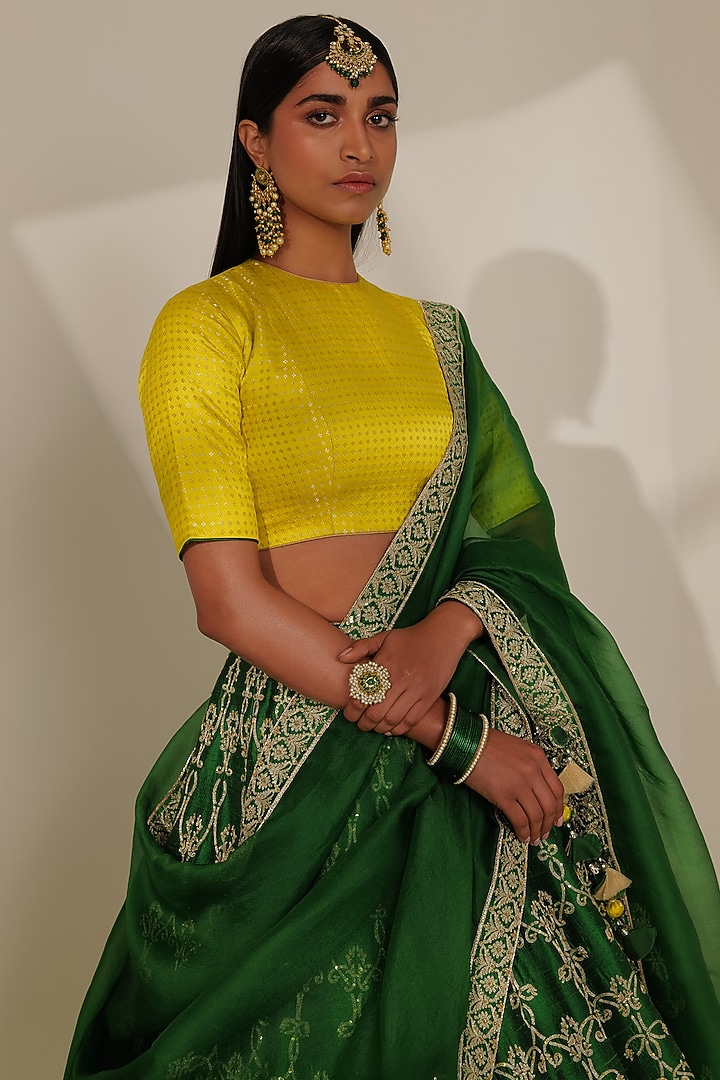 Green Pure Raw Silk Embroidered Bridal Lehenga Set by Taisha at Pernia's Pop Up Shop