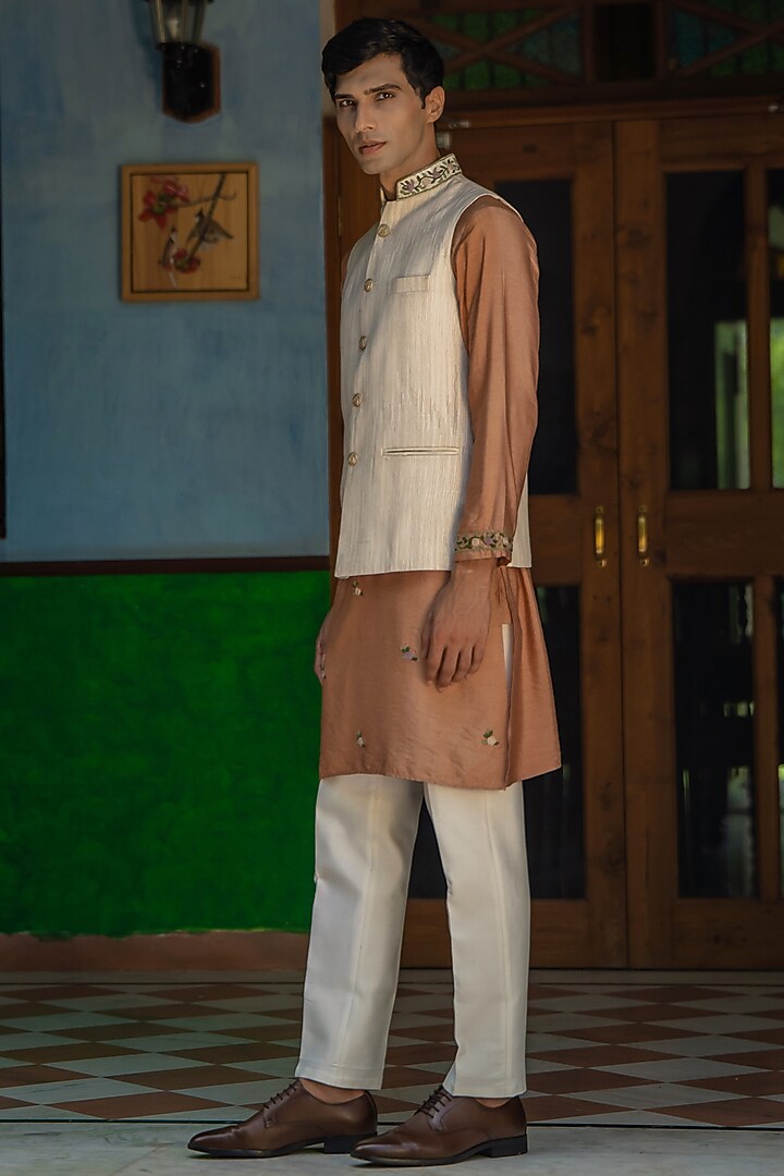 Beige Linen Hand Embroidered Bundi Jacket Set by TAJIRI at Pernia's Pop Up Shop