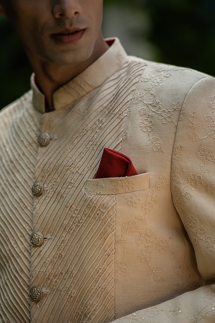 Beige Linen Machine Embroidered Bandhgala Set by TAJIRI at Pernia's Pop Up Shop