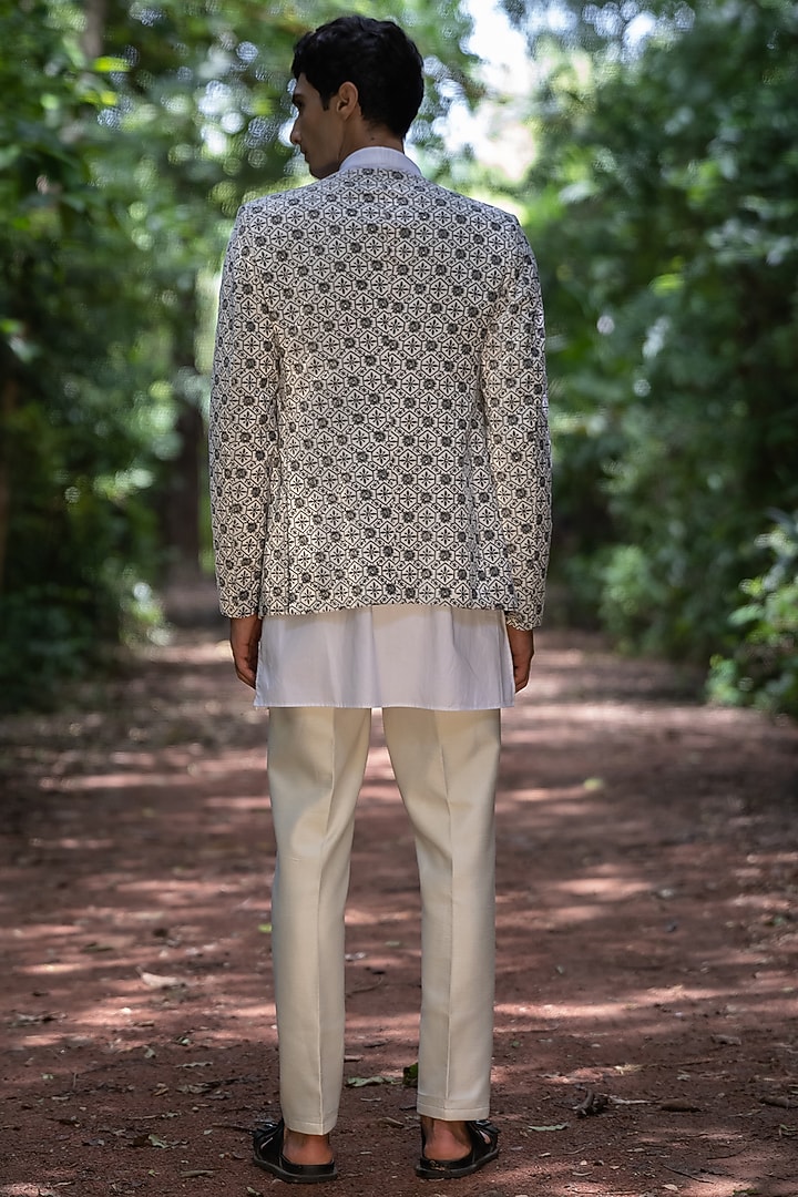 Ivory Velvet Machine Embroidered Indowestern Set by TAJIRI at Pernia's Pop Up Shop