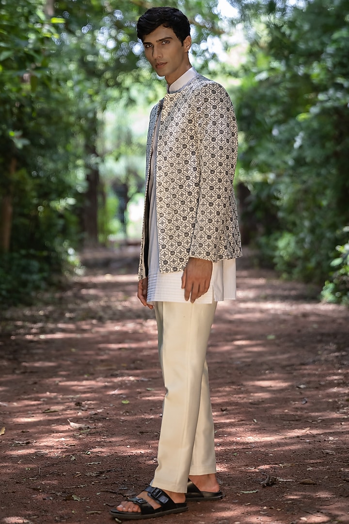 Ivory Velvet Machine Embroidered Indowestern Set by TAJIRI at Pernia's Pop Up Shop