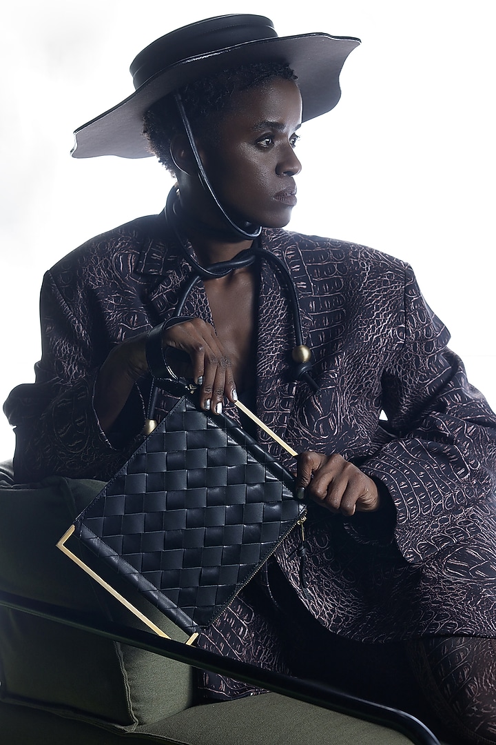 Black Genuine Leather Clutch by Tann-ed at Pernia's Pop Up Shop