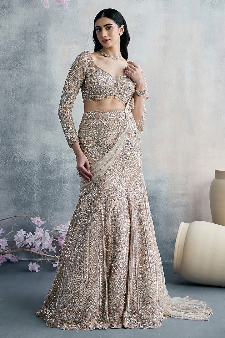 Golden Net Sequins Embroidered Fish-Cut Bridal Lehenga Set by Tanaksh at Pernia's Pop Up Shop