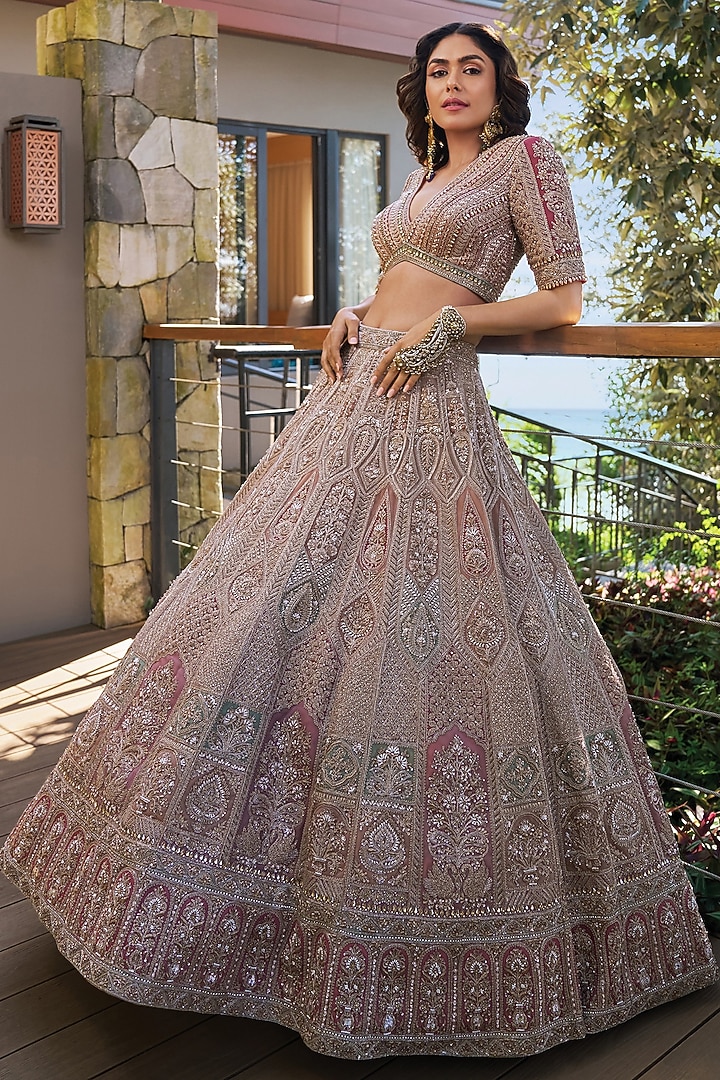 Golden Net Nakshi & Cutdana Embroidered Bridal Lehenga Set by Tanaksh at Pernia's Pop Up Shop