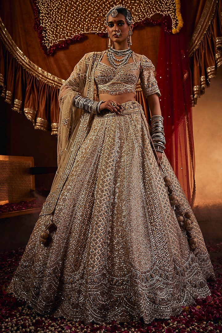 Golden Net Zari & Sequins Embroidered Bridal Lehenga Set by Tanaksh at Pernia's Pop Up Shop