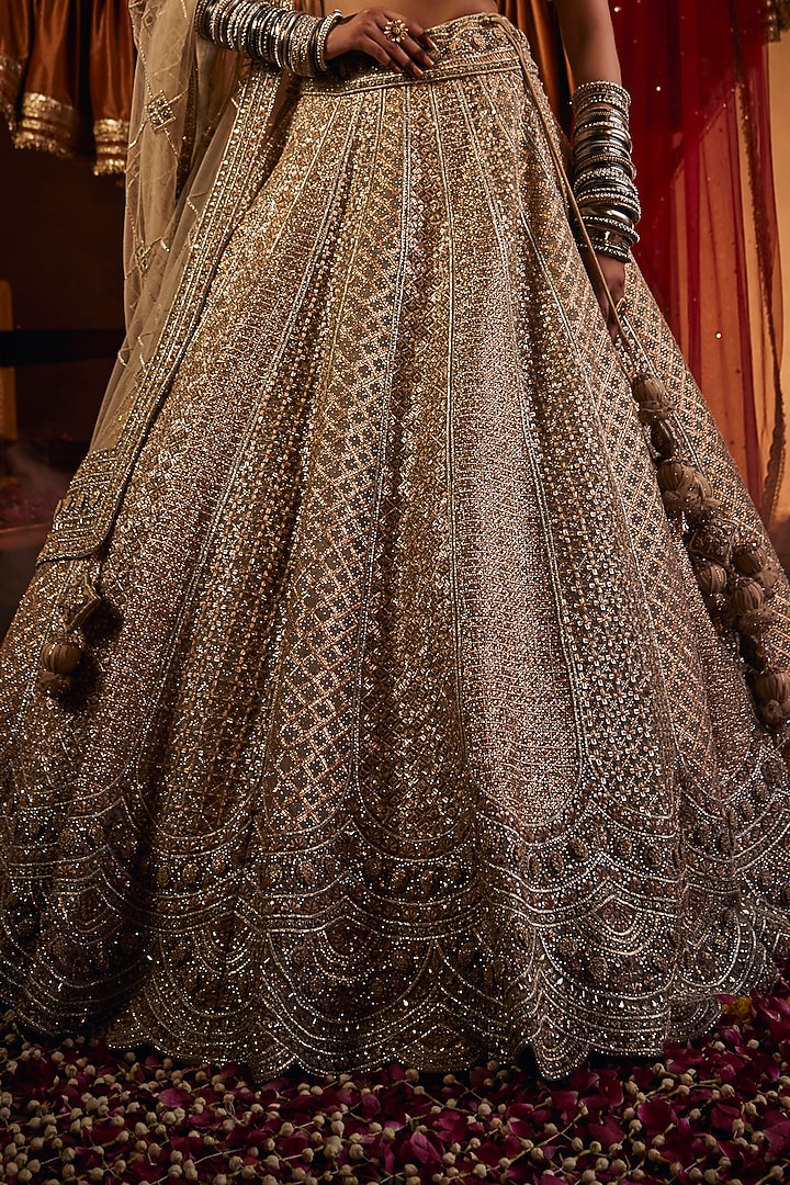 Golden Net Zari & Sequins Embroidered Bridal Lehenga Set by Tanaksh at Pernia's Pop Up Shop