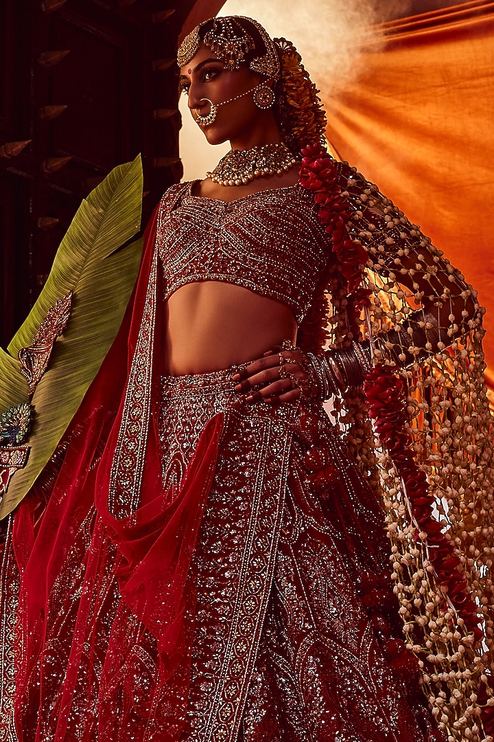 Red Net Cutdana & Sequins Embroidered Bridal Lehenga Set by Tanaksh at Pernia's Pop Up Shop