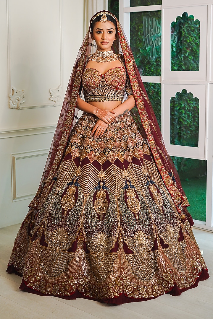 Maroon Net Dabka & Sequins Embroidered Bridal Lehenga Set by Tanaksh at Pernia's Pop Up Shop