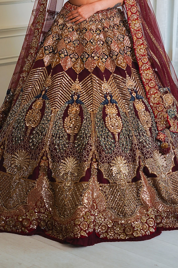 Maroon Net Dabka & Sequins Embroidered Bridal Lehenga Set by Tanaksh at Pernia's Pop Up Shop