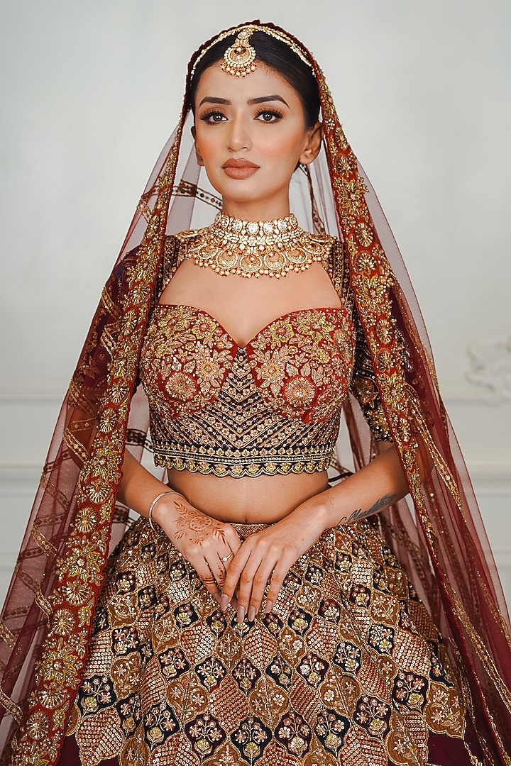 Maroon Net Dabka & Sequins Embroidered Bridal Lehenga Set by Tanaksh at Pernia's Pop Up Shop