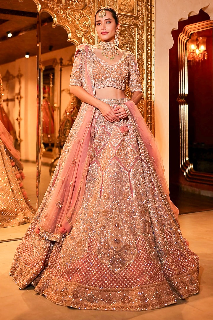 Soft Pink Net Sequins & Cutdana Embroidered Bridal Lehenga Set by Tanaksh at Pernia's Pop Up Shop