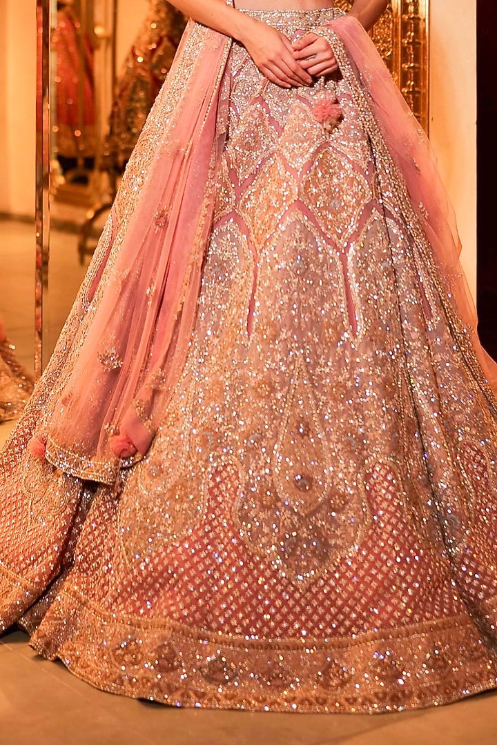 Soft Pink Net Sequins & Cutdana Embroidered Bridal Lehenga Set by Tanaksh at Pernia's Pop Up Shop