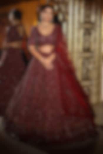 Maroon Velvet Dori & Crystal Embroidered Bridal Lehenga Set by Tanaksh at Pernia's Pop Up Shop