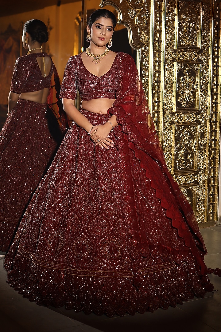 Maroon Velvet Dori & Crystal Embroidered Bridal Lehenga Set by Tanaksh at Pernia's Pop Up Shop