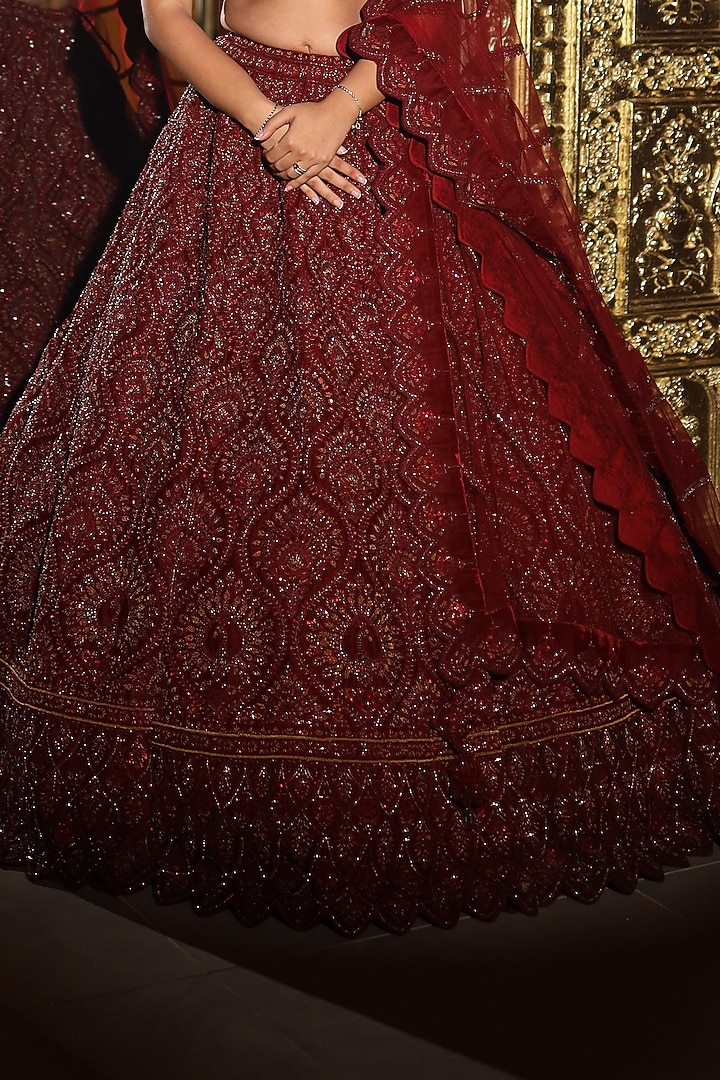 Maroon Velvet Dori & Crystal Embroidered Bridal Lehenga Set by Tanaksh at Pernia's Pop Up Shop