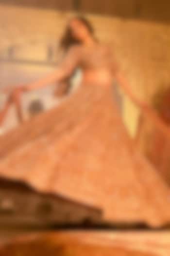 Rose Gold Net Nakshi & Dori Embroidered Bridal Lehenga Set by Tanaksh at Pernia's Pop Up Shop