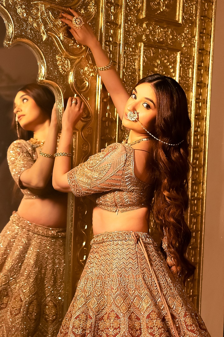 Rose Gold Net Nakshi & Dori Embroidered Bridal Lehenga Set by Tanaksh at Pernia's Pop Up Shop