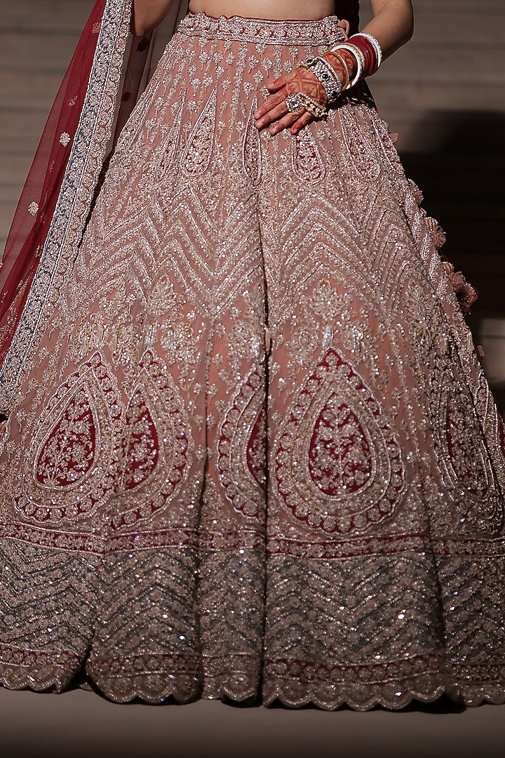 Light Peach Net Dabka & Cutdana Embroidered Bridal Lehenga Set by Tanaksh at Pernia's Pop Up Shop